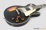 Vintage V100 Icon Singlecut Electric Guitar - Distressed Black Over Sunburst